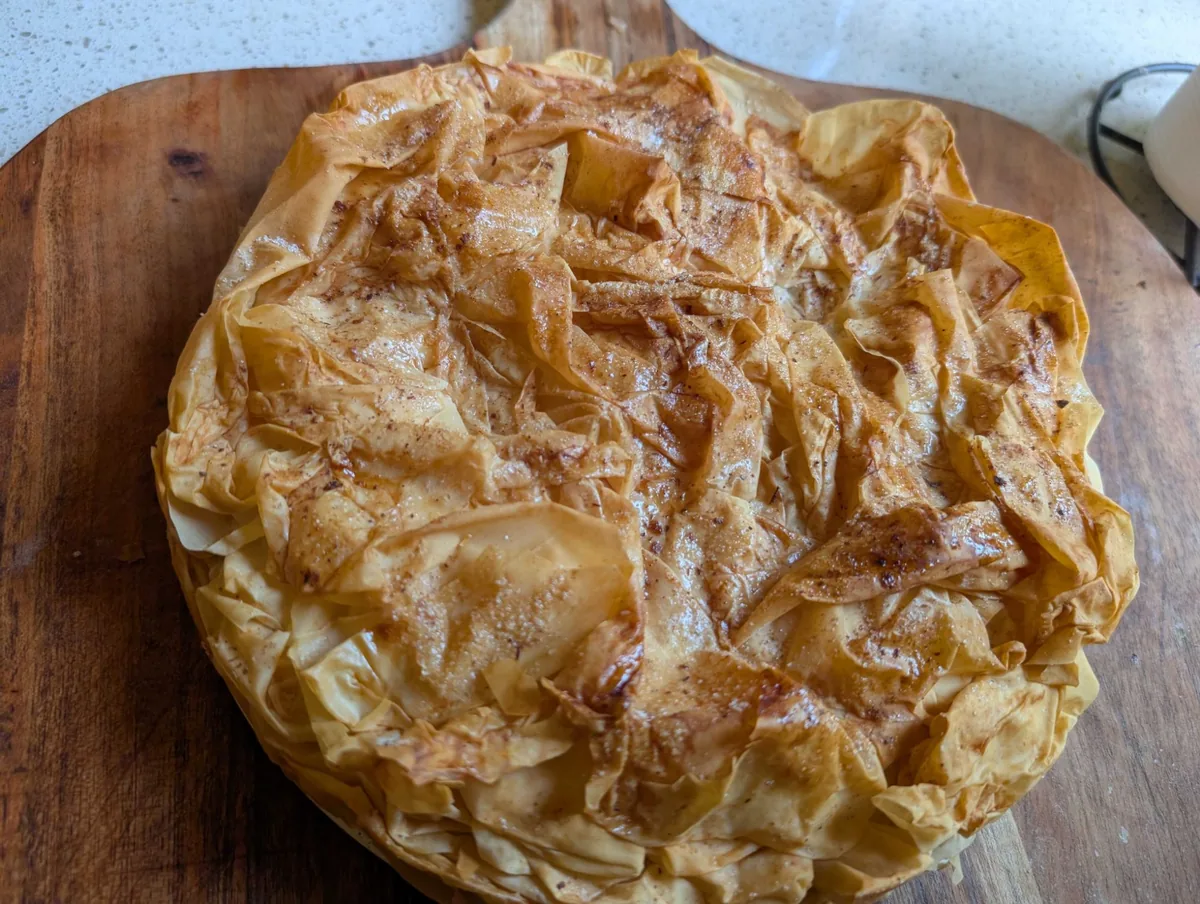 The filo crown from above, glossy and dusted with cinnamon sugar